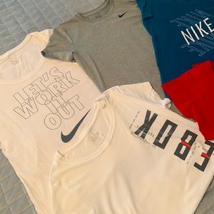 3 Nike and 2 Reebok T-shirts